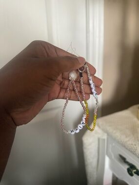 “Love” and “Faith Phone Charm Lanyard - cell phone wristlet bracelet straps